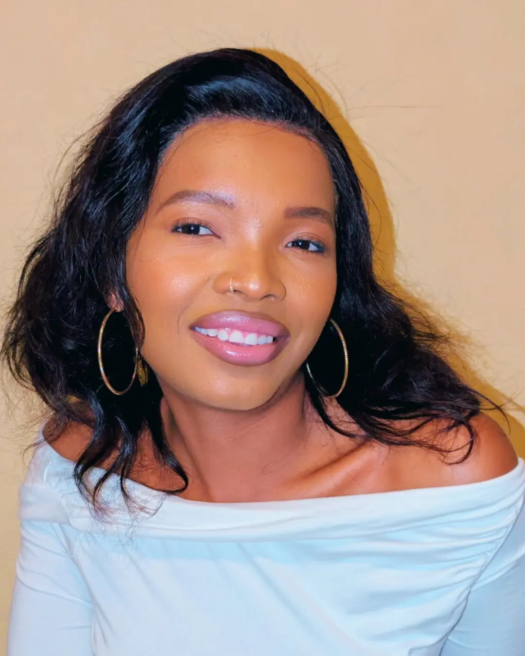 Close-up portrait of Dimpho Mlimi smiling